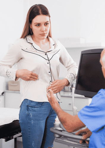 Doctor talking to female patient