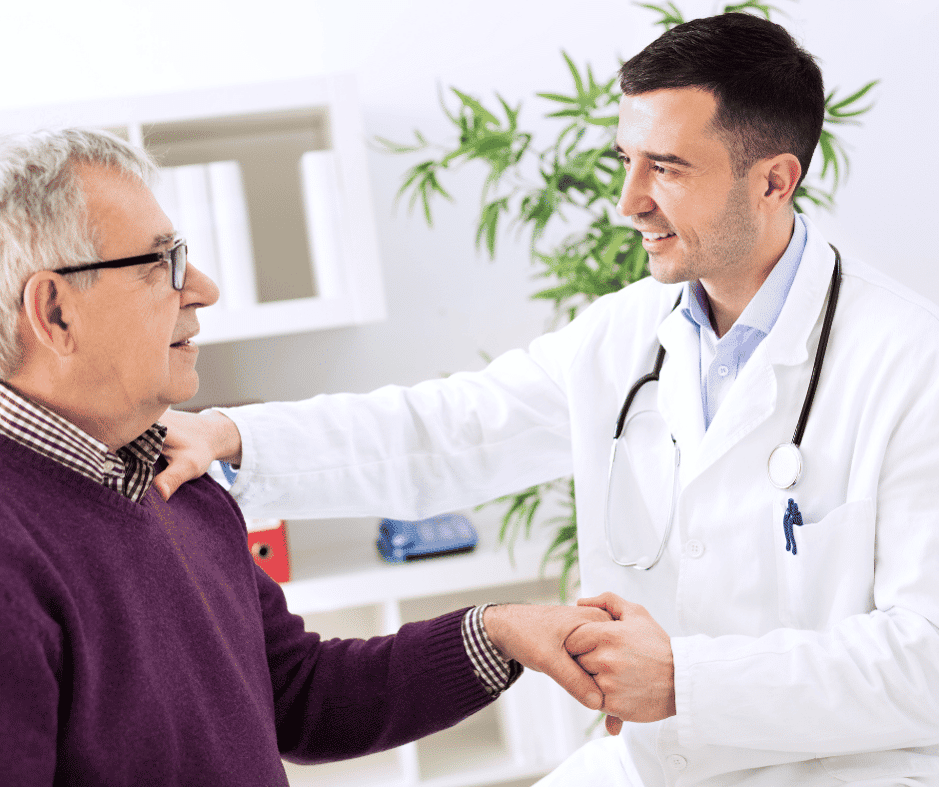 Doctor talking with an elderly male patient