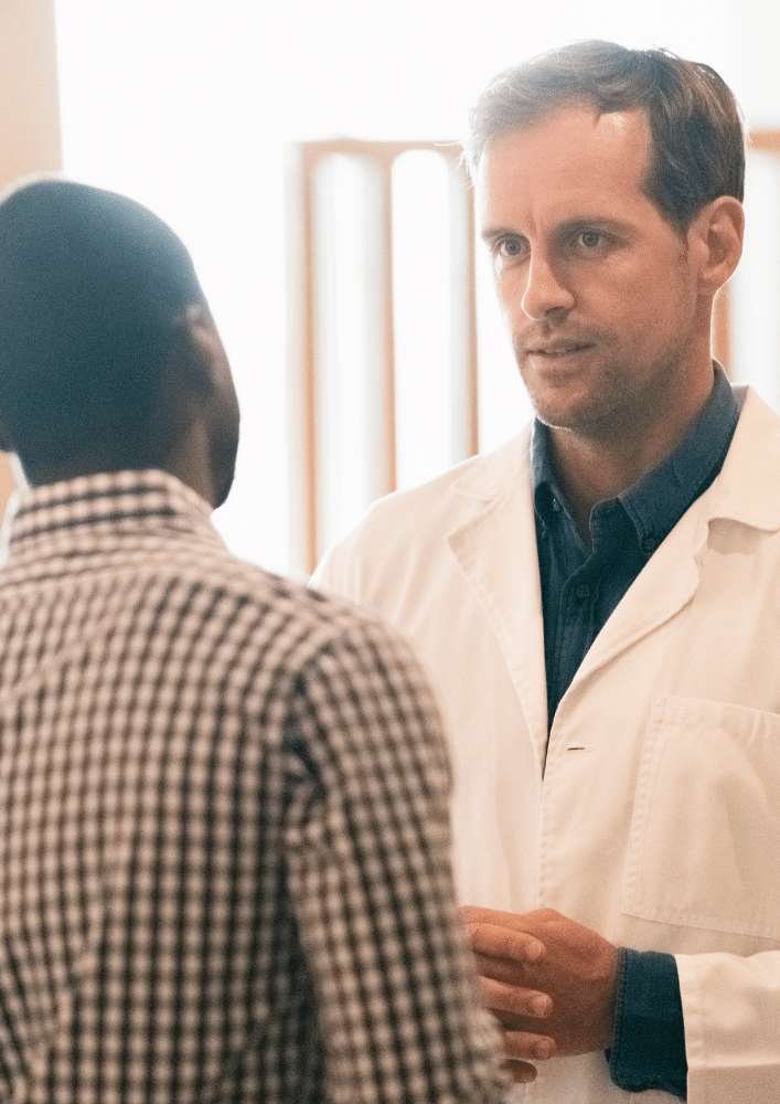 Doctor speaking with patient about BPH Doctor speaking with patient about BPH